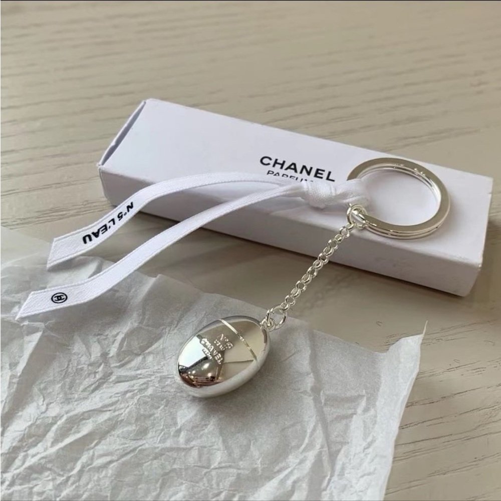 Silver Keychain with White Ribbon